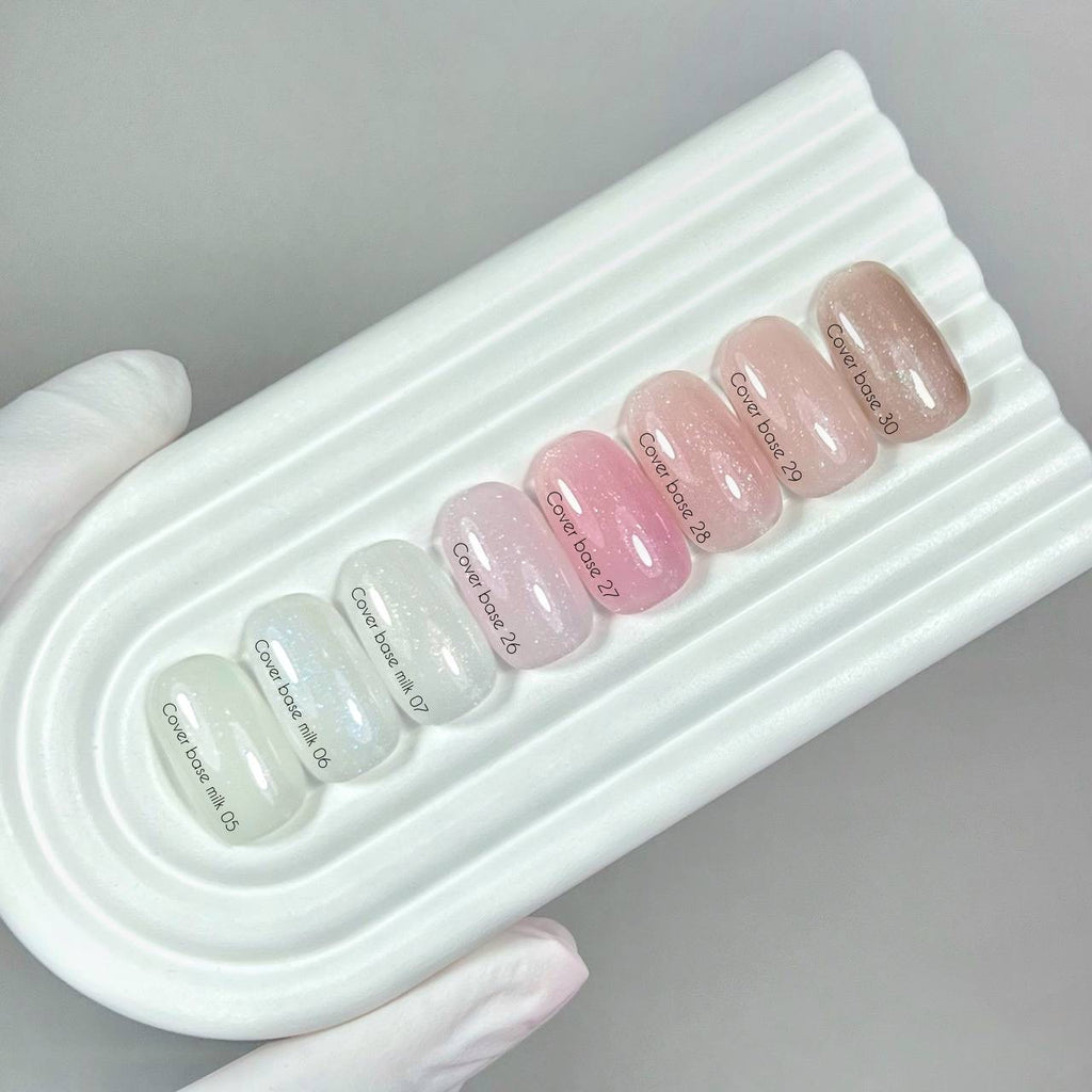 NAILSOFTHEDAY Cover Base Milk 06 Shimmer – semi-transparent milky base coat with blue shimmer for nails, 10 ml.