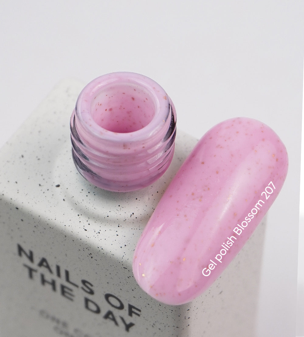 NAILSOFTHEDAY Gel Polish Blossom – delicate pink gel nail polish with gold foil, opaque in one coat.